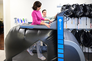 Woman walking on an AlterG treadmill