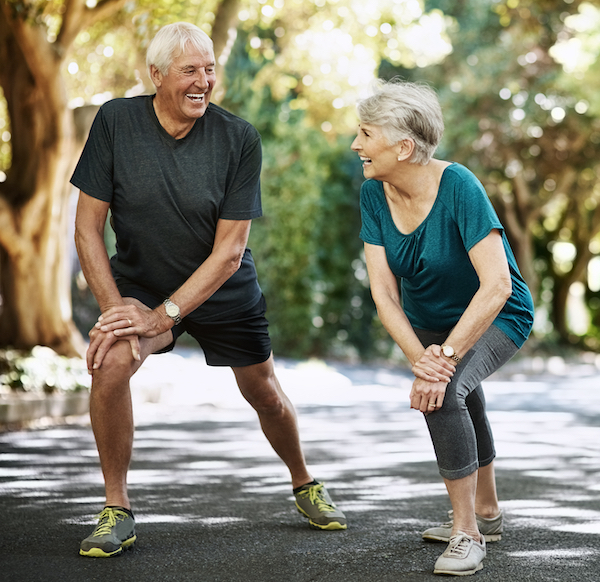 Man and woman stretching