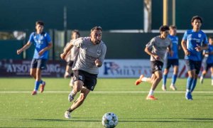 soccer player running during game