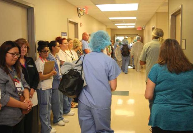 Hospital staff lining the hall to pay respects to Paula Swain