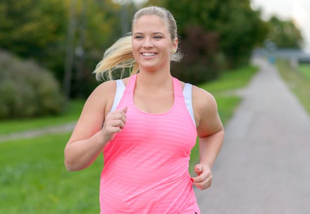 A woman going for a run after having weight-loss surgery