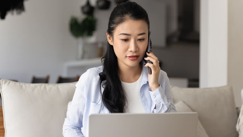 woman at computer scheduling an appointment