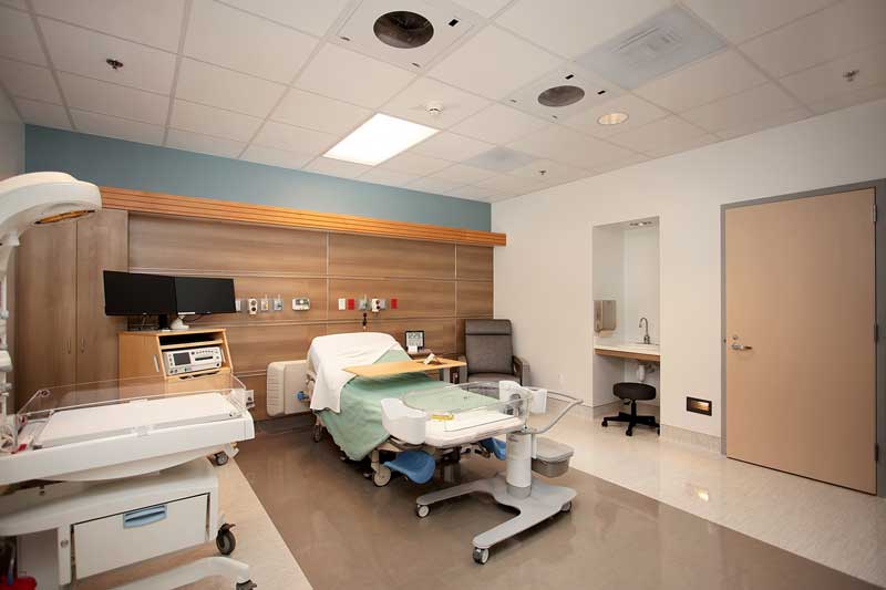 The Birth Place patient room hallway and nurses station