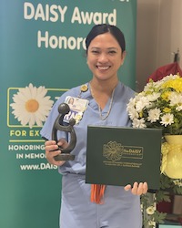 Miriam Berglund receiving her DAISY Award