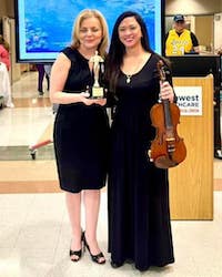 Miriam Berglund receiving her Super DAISY Award